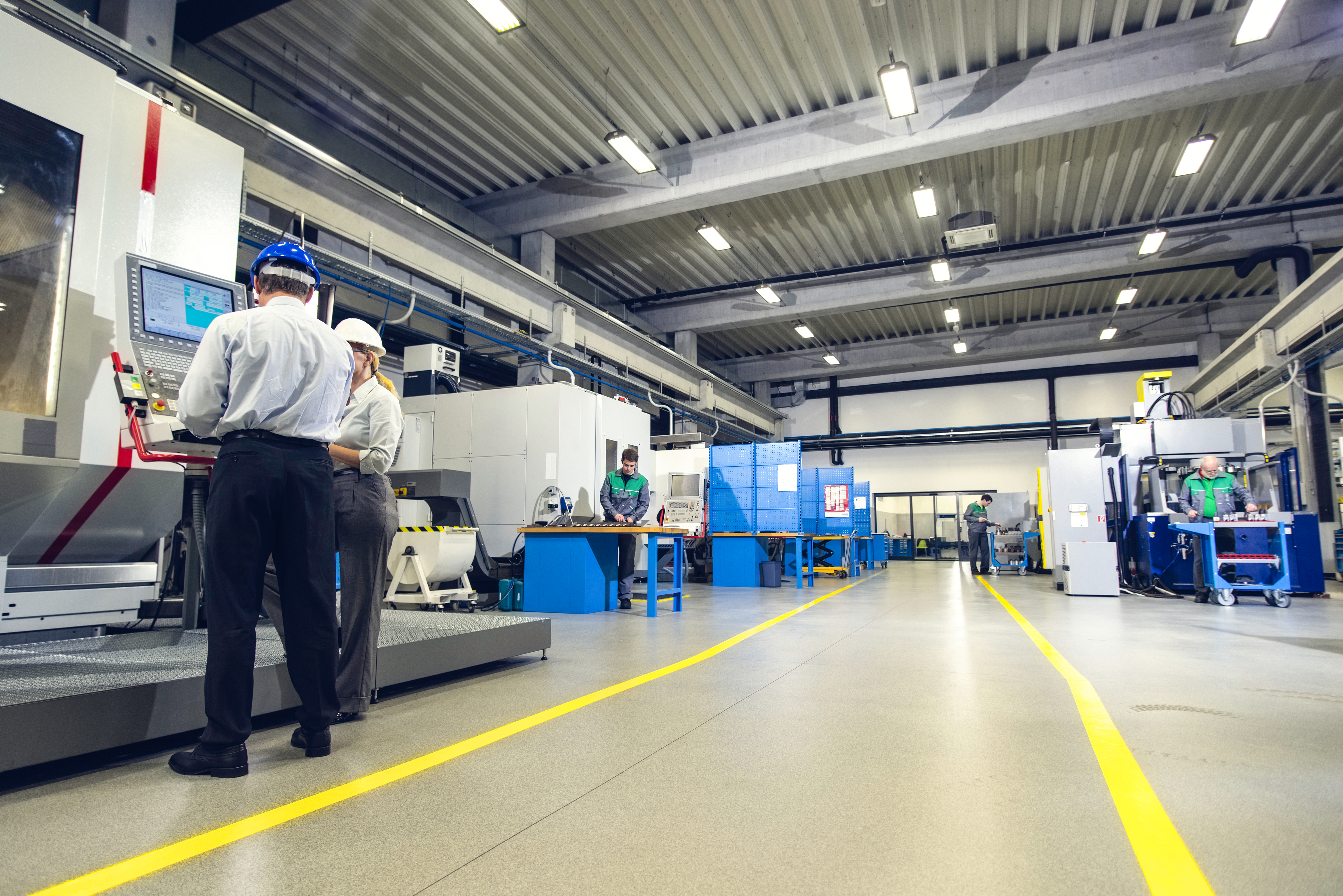 iStock_41470466_XLARGE-Workers in Manufacturing Plant